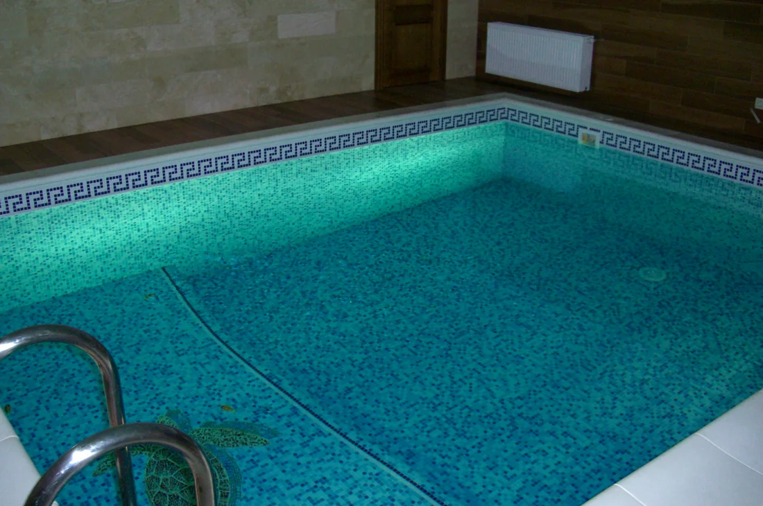 Pool area with electrical lighting